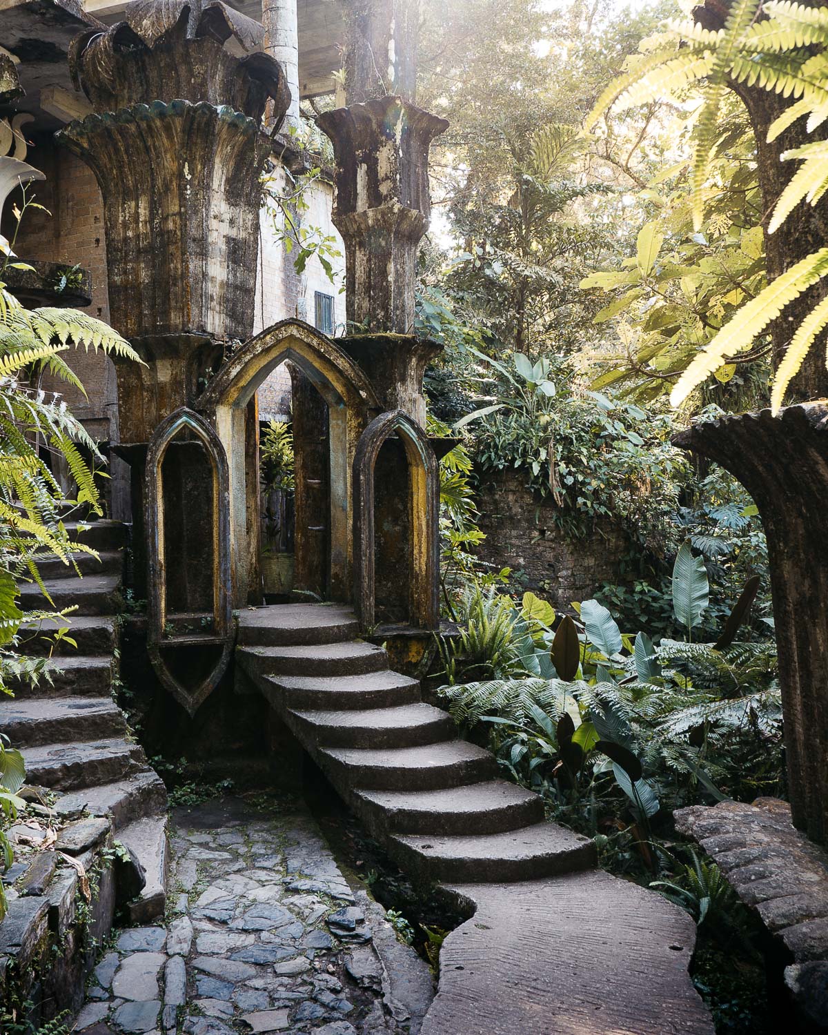 Edward James' Surrealist Garden, surrealistic buildings in the middle of the forest