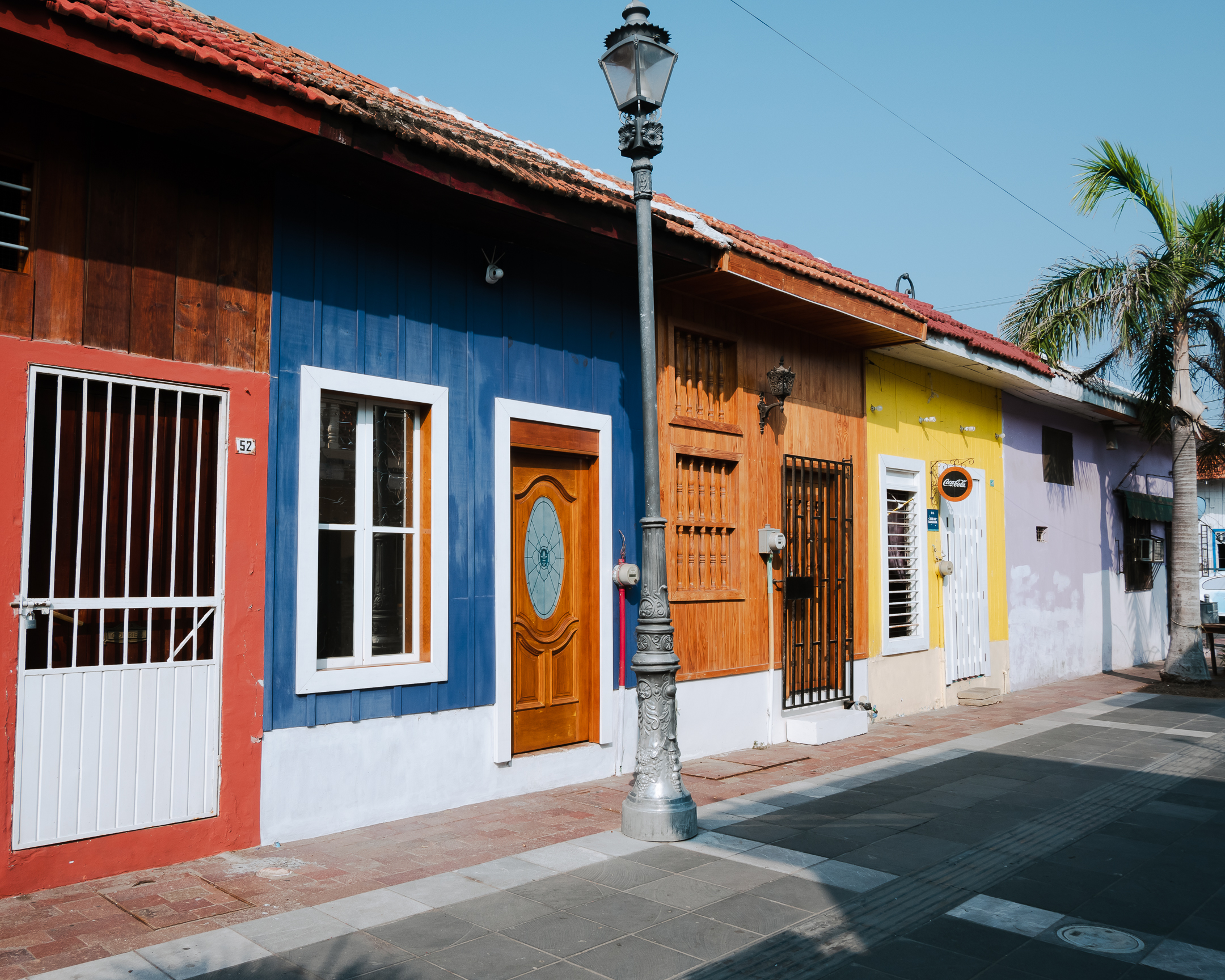 Colorful neighbourhood with houses made of wood and painted of vibrant colors